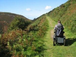 Exploring Heddon Valley on a tramper. Rolling hills can be seen.