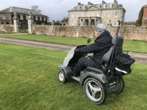 Tramper user exploring the grounds of National Trust Antony. Grand buildings and a gated entrance are in view