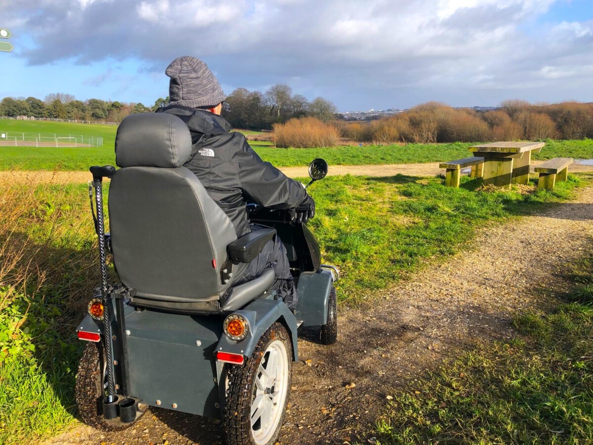 All terrain mobility scooter in parkland at Upton Country Park